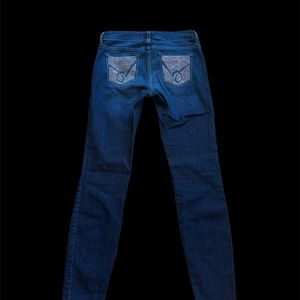 BEBE- mid rise woman’s jeans- straight leg- size 27- excellent condition.